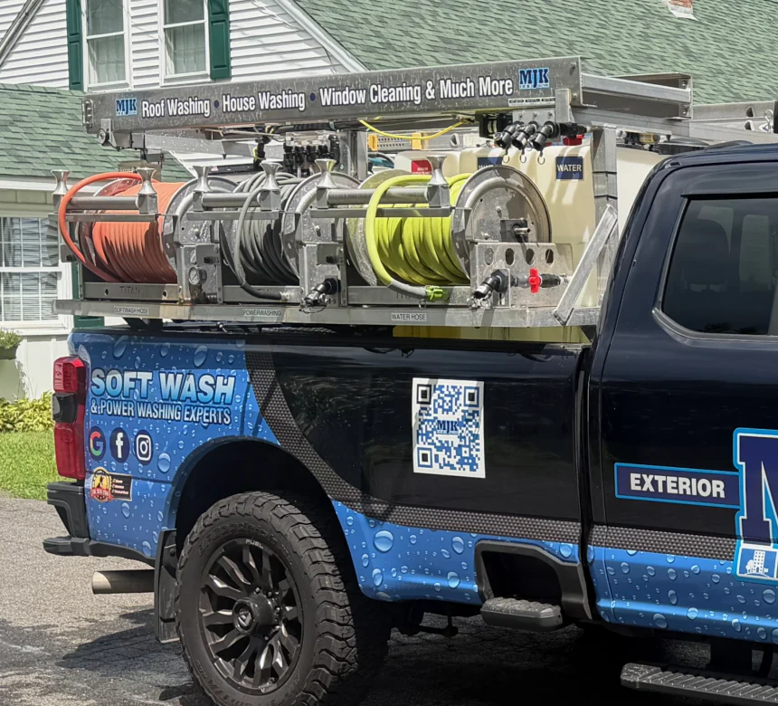 MJK Solutions soft wash rig with hose reels and water tank mounted on the truck, Poughkeepsie, NY