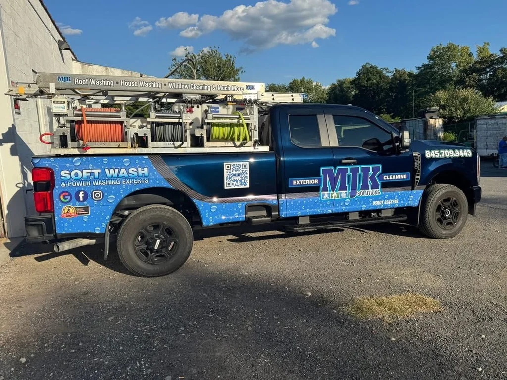 MJK Solutions black soft wash truck with the rig loaded, ready for a route in Dutchess County, NY
