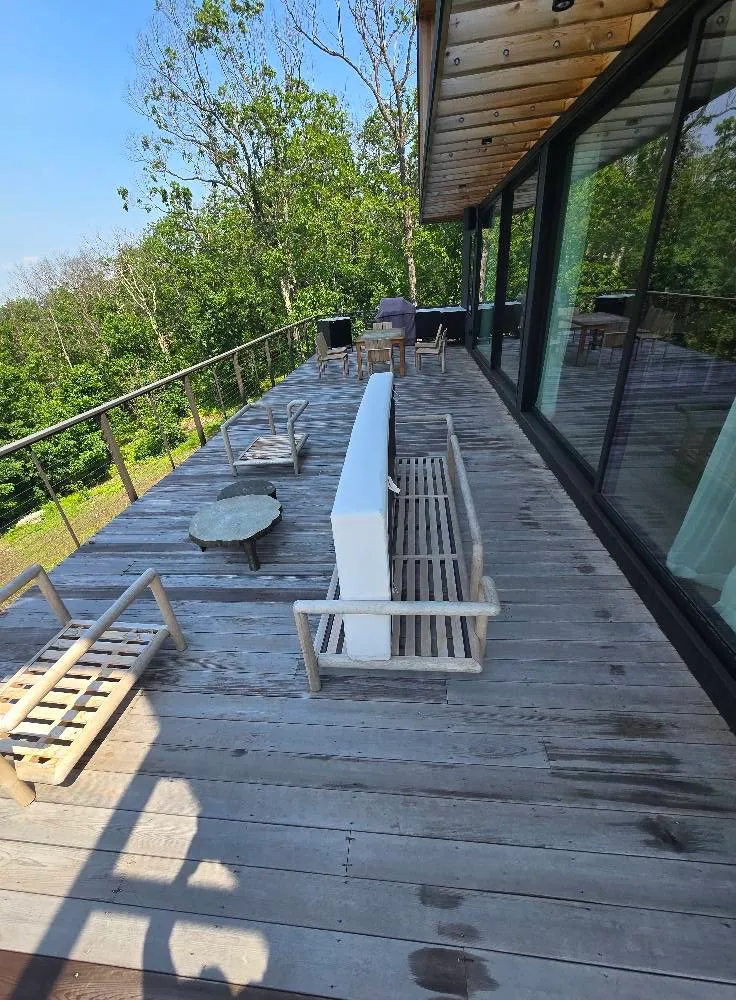 Weathered gray wood deck before professional deck cleaning by MJK Solutions in Dutchess County, NY