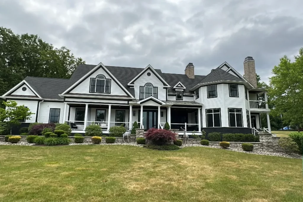 White colonial estate home in northern Dutchess County, NY after a full soft wash by MJK Solutions